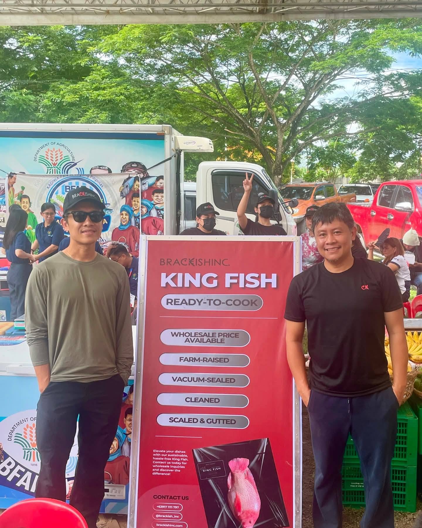 Brackish Inc. team presenting King Fish ready-to-cook red tilapia at a market event